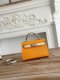 Hermes Mini Kelly II Handbag in Juane D'or and Craie Epsom Leather with Silver Hardware Hermes Mini Kelly II Handbag in Juane D'or and Craie Epsom Leather with Silver Hardware